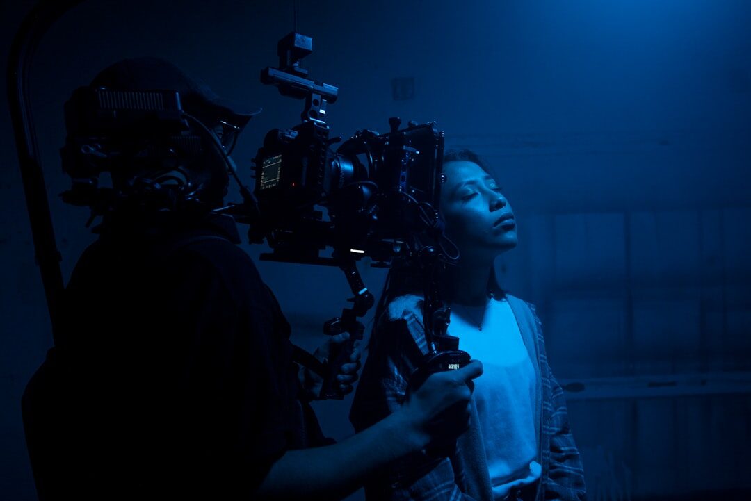 cinematographer adjusting lights